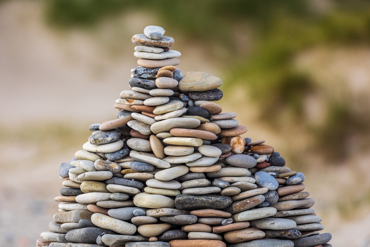 100s of stones stacked in a pile
